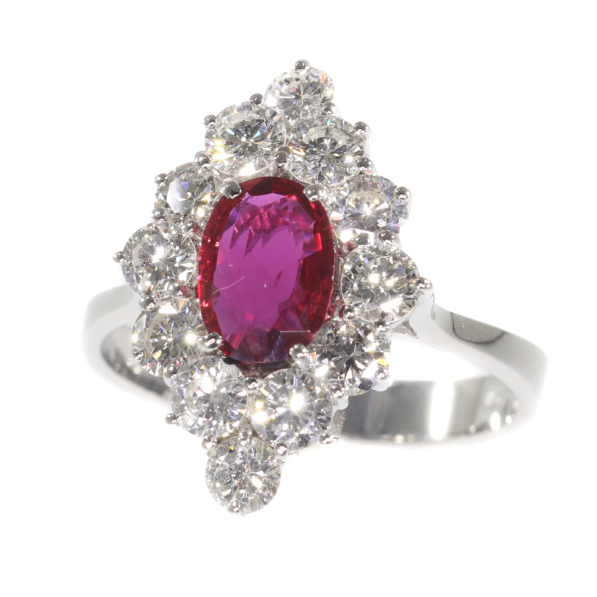 Vintage 1970's ring with beautiful ruby and set with 12 brilliant cut diamonds